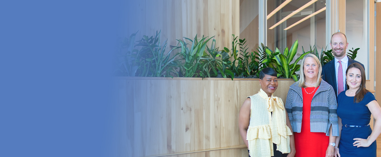 United Way President and CEO, Michelle Tucker, stands by Campaign Co-Chairs and Vice Chair